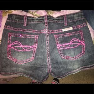 Pink stitching Cowgirl Tuff shorts!